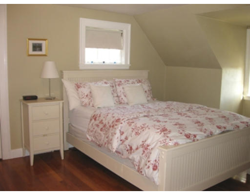 156 Thornton Road Needham, MA 02492 - Photo 6 of 12 a bedroom with a bed and a window