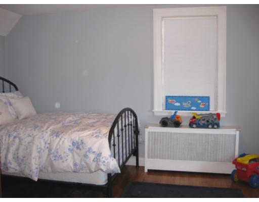 156 Thornton Road Needham, MA 02492 - Photo 8 of 12 a bedroom with a bed and a window