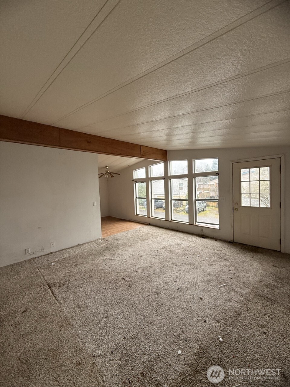 14003 70th Street East Sumner, WA 98390 - Photo 9 of 20 a view of an empty room with a window
