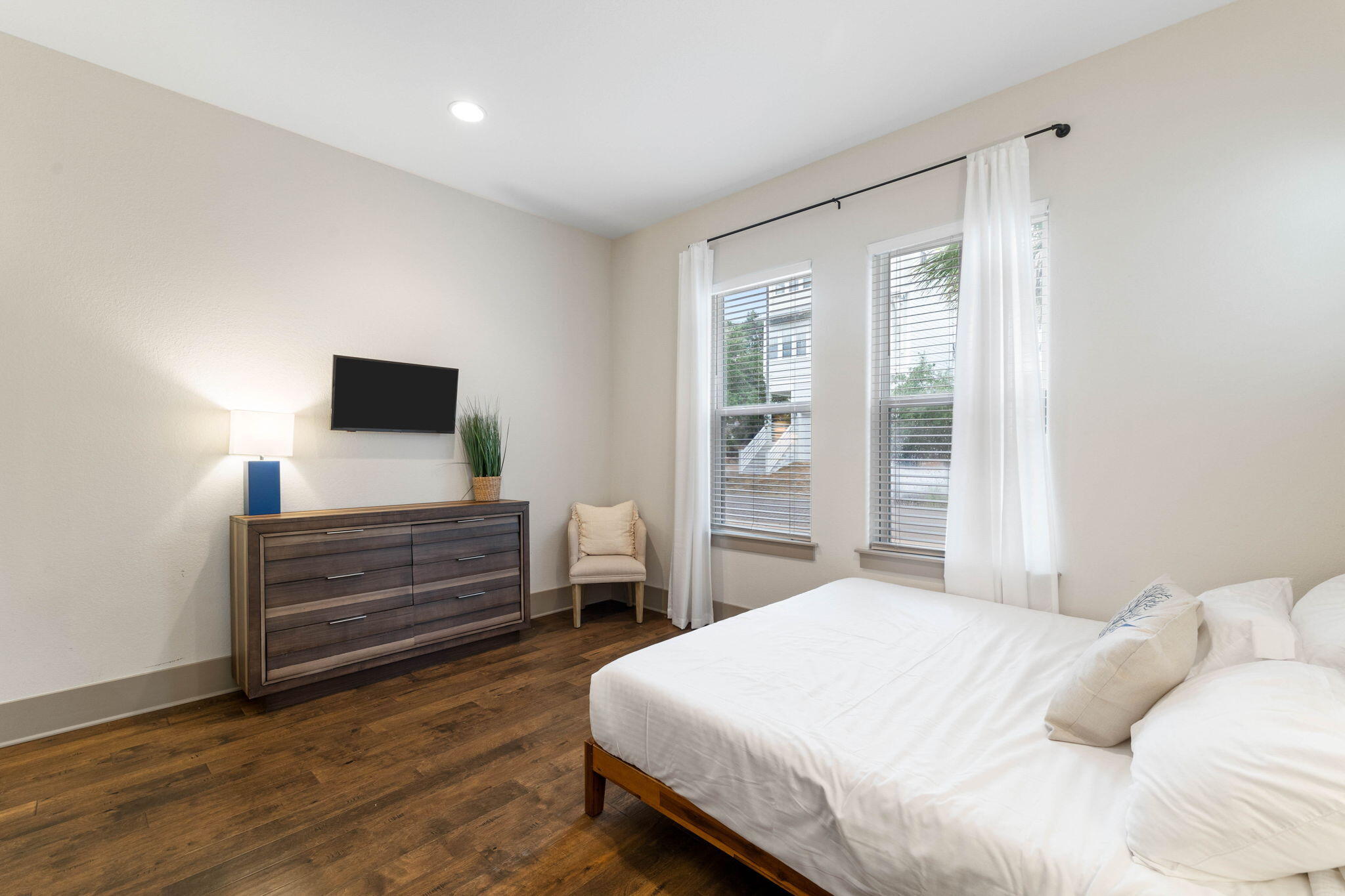 267 Gulfview Circle Santa Rosa Beach, FL 32459 - Photo 19 of 46 a bedroom with a bed and a flat screen tv