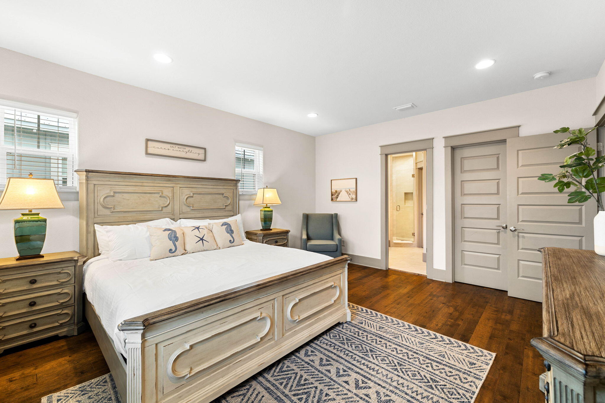 267 Gulfview Circle Santa Rosa Beach, FL 32459 - Photo 30 of 46 a bedroom with a large bed and a dresser