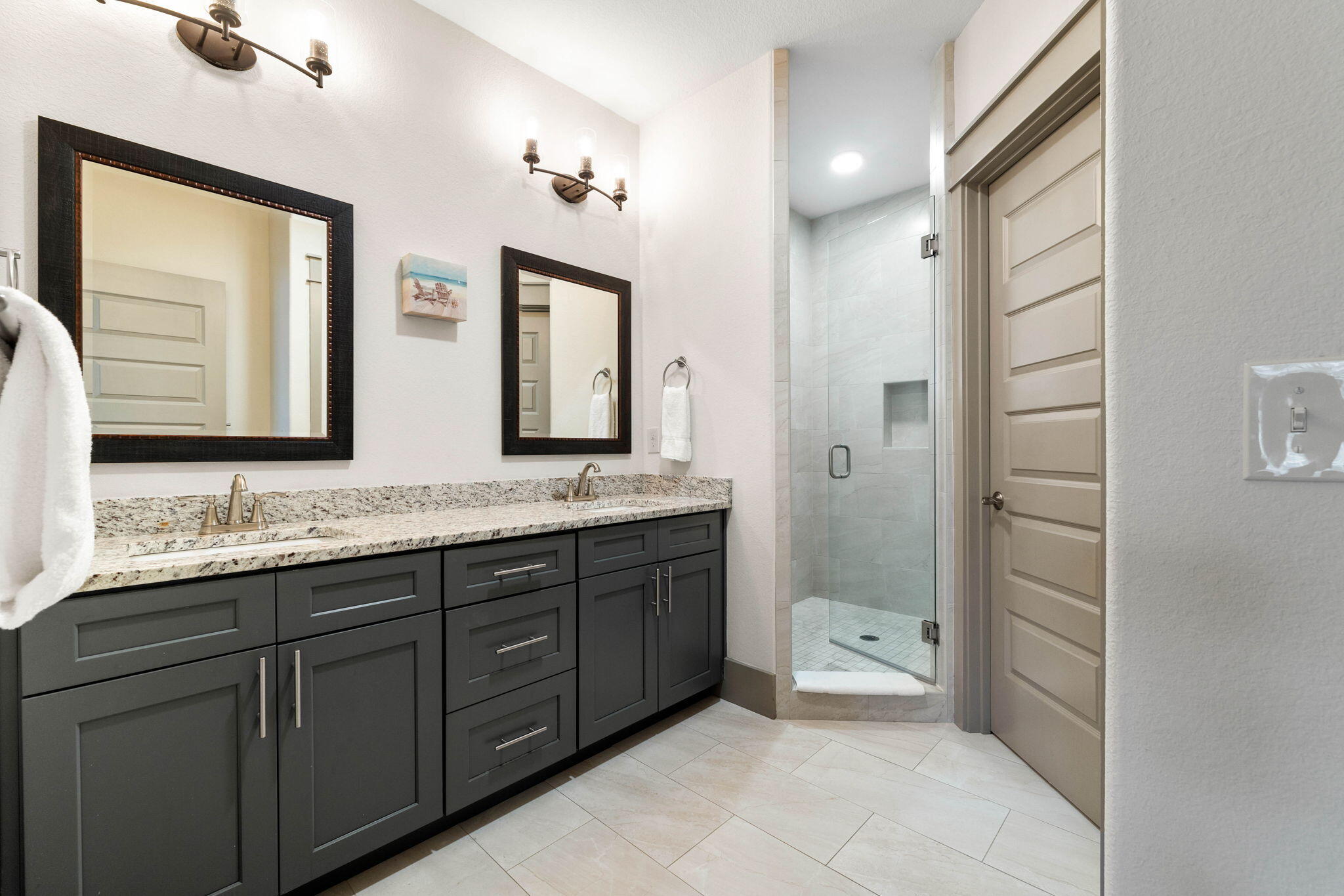 267 Gulfview Circle Santa Rosa Beach, FL 32459 - Photo 32 of 46 a bathroom with double sink and a mirror