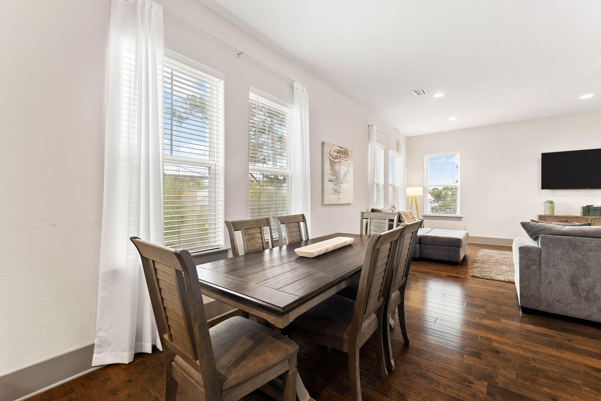 267 Gulfview Circle Santa Rosa Beach, FL 32459 - Photo 9 of 46 a view of a dining room with furniture and wooden floor