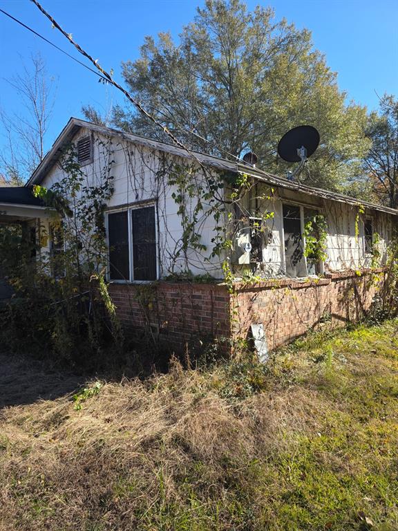 908 Burns Street Kilgore, TX 75662 - Photo 2 of 20 a view of a house with a yard