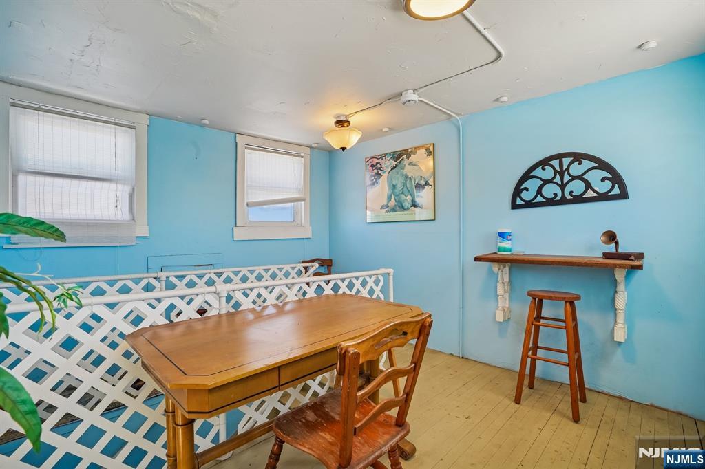 82 Hackensack Street, Unit 6 Wood-Ridge, NJ 07075 - Photo 20 of 28 a bathroom with a sink and a mirror