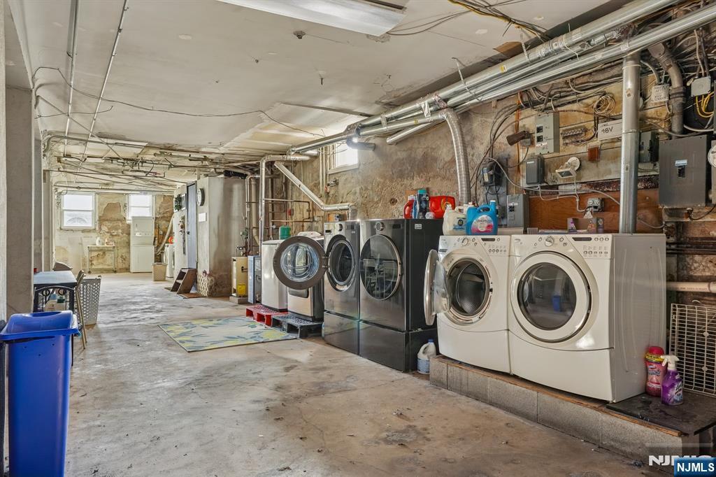 82 Hackensack Street, Unit 6 Wood-Ridge, NJ 07075 - Photo 22 of 28 a view of a storage room with washer and dryer