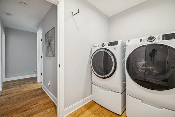 a view of a storage & utility room with washer and dryer