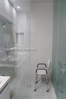 a bathroom with a sink toilet and vanity
