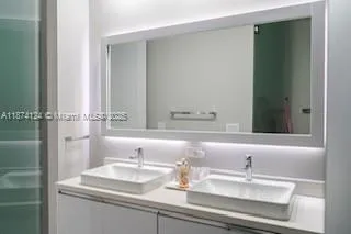 a bathroom with a toilet and a bathtub
