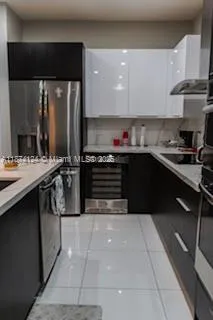 a bedroom with a bed and a mirror