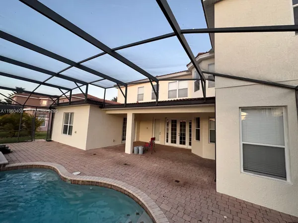 an empty room with a empty space and a window