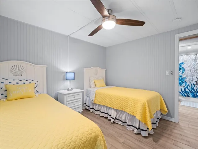 a bathroom with a sink mirror vanity and toilet
