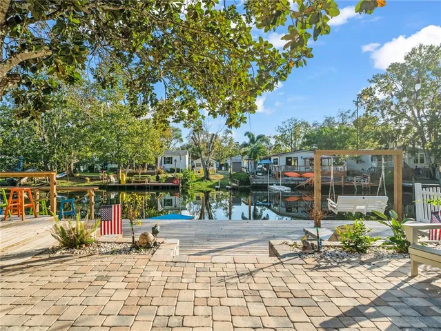 a view of a chairs and table on the wooden floor