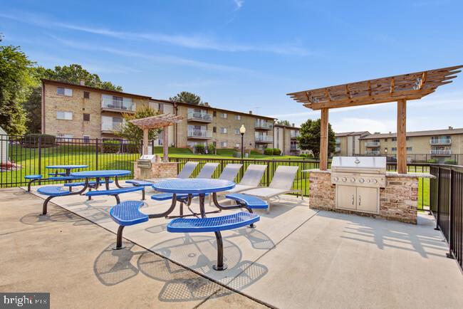 111 Idlewild Road, Unit 1B Bel Air, MD 21014 - Photo 8 of 13 a view of a chairs and table in the patio