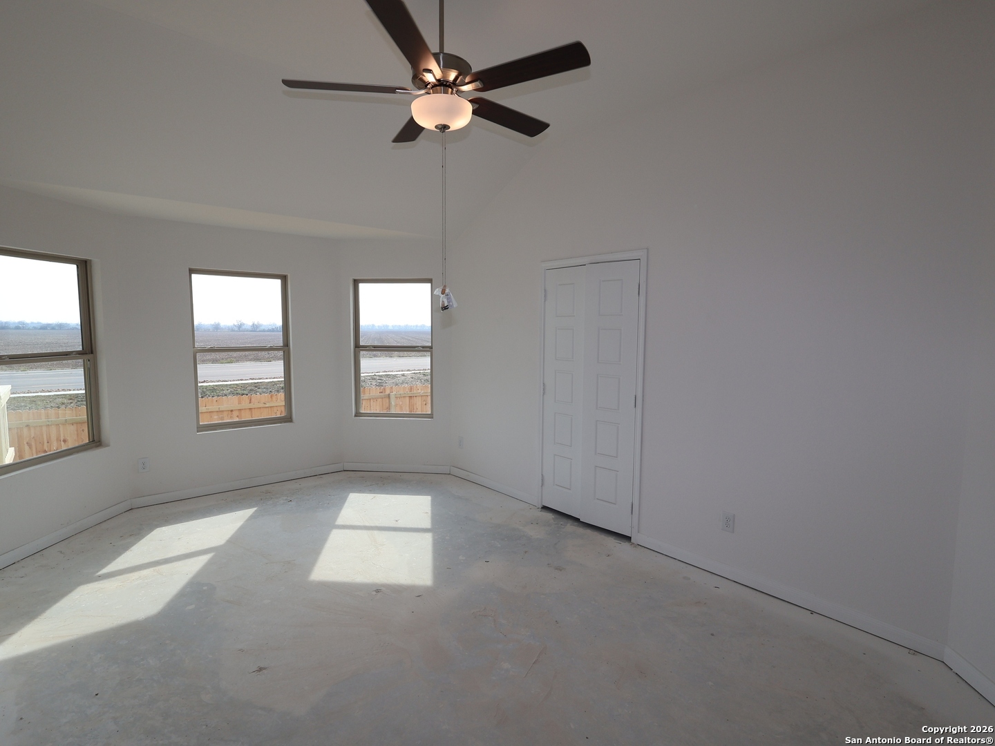 1177 Limestone Ridge Seguin, TX 78155 - Photo 26 of 40 an empty room with windows and fan