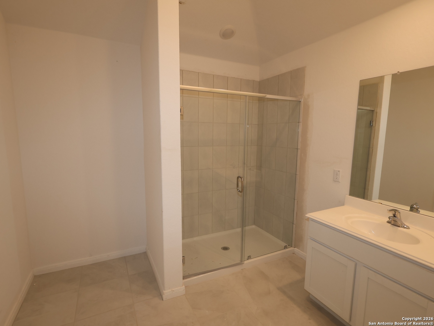 1177 Limestone Ridge Seguin, TX 78155 - Photo 27 of 40 a bathroom with a shower and a sink