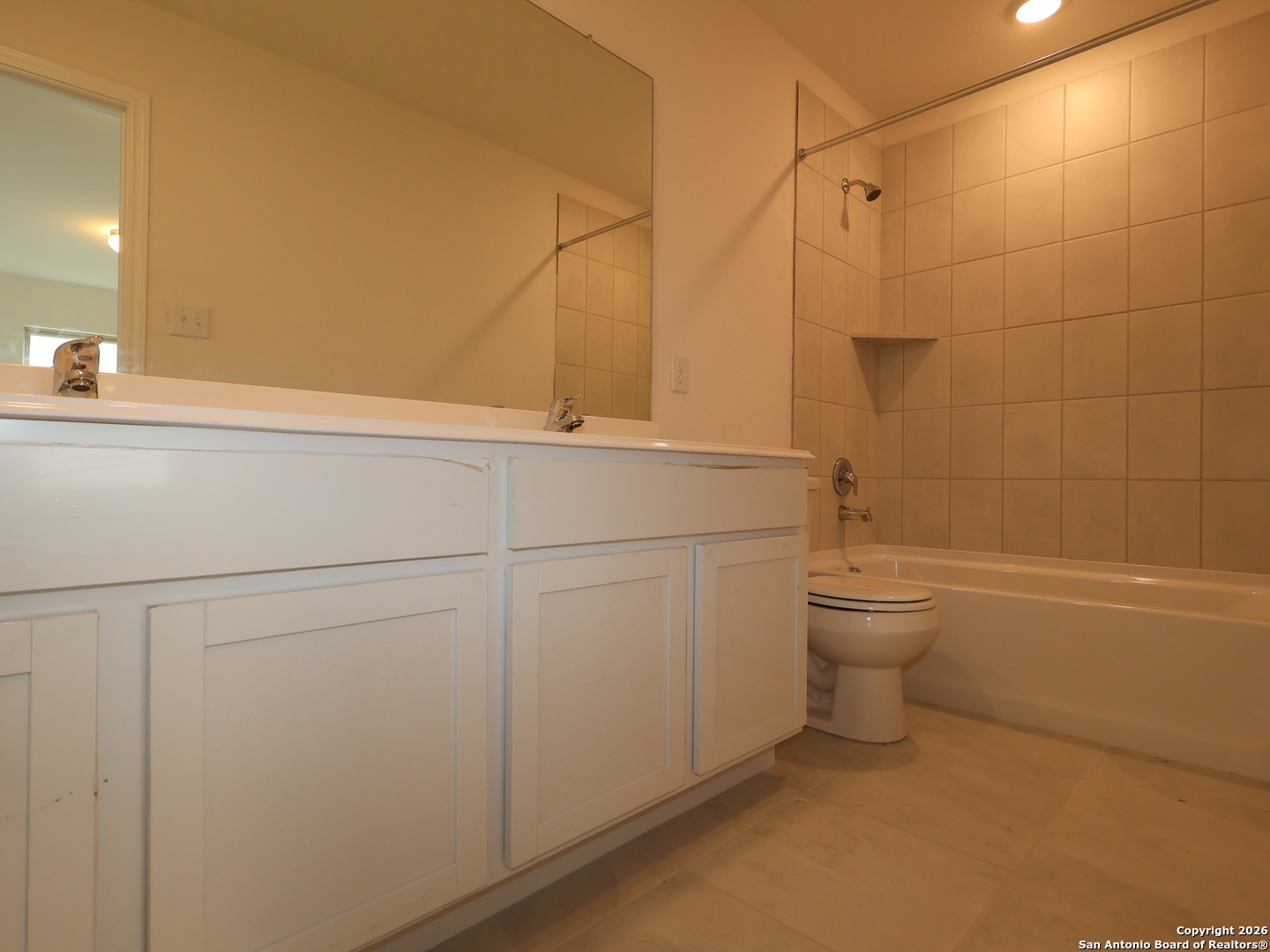 1177 Limestone Ridge Seguin, TX 78155 - Photo 32 of 40 a bathroom with a toilet a sink and bathtub