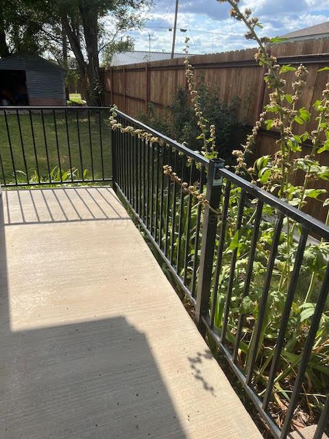 530 South Main Street Booker, TX 79005 - Photo 10 of 10 a view of balcony with wooden floor