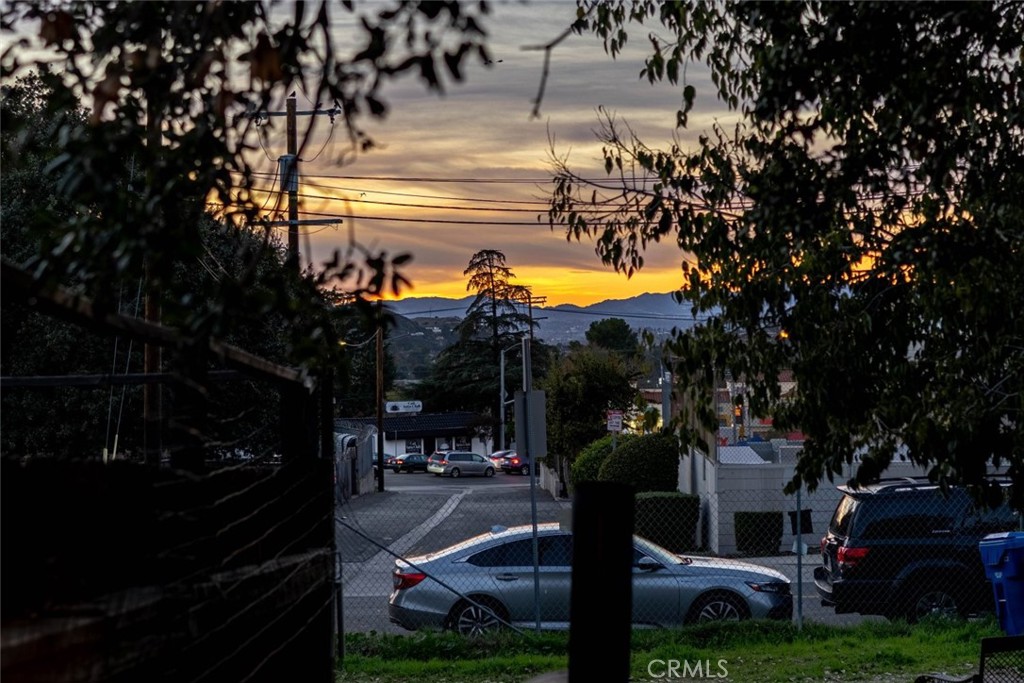 10434 Irma Avenue Tujunga, CA 91042 - Photo 20 of 29 a front view of a building with trees