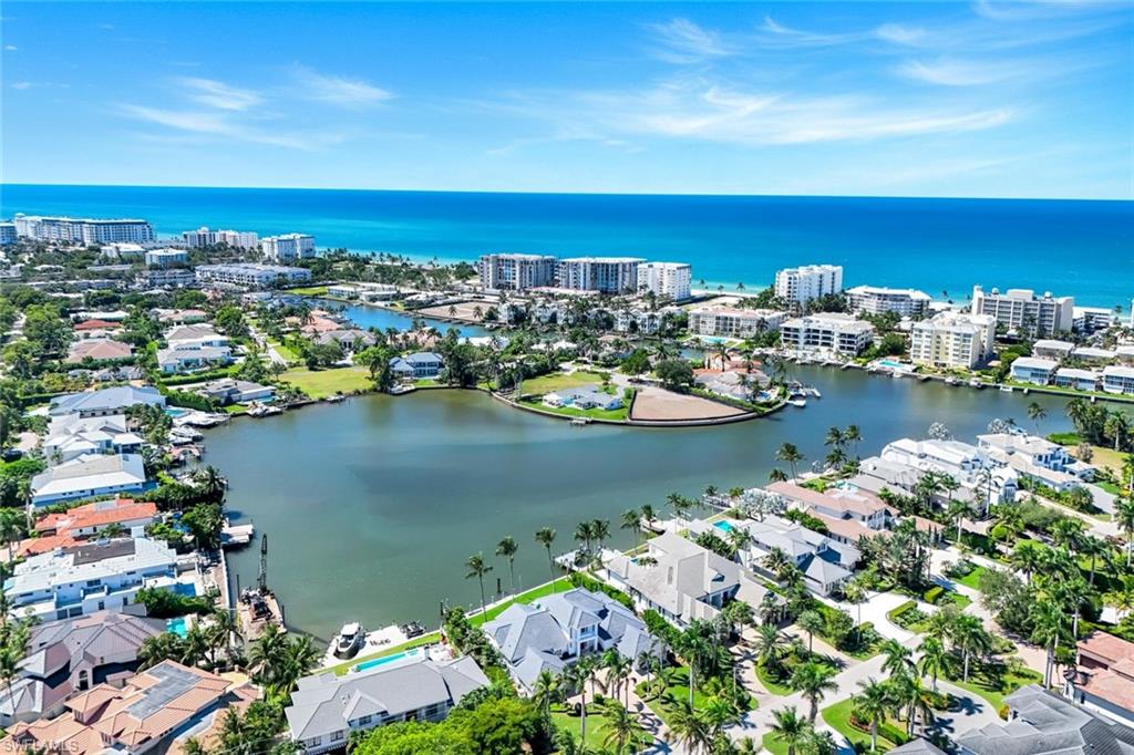 400 Springline Drive Naples, FL 34102 - Photo 5 of 37 View of urban area with a large body of water