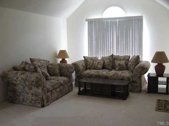 11113 North Radner Way Raleigh, NC 27613 - Photo 2 of 10 living room portion of living room-dining room combination