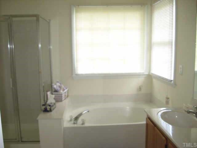 11113 North Radner Way Raleigh, NC 27613 - Photo 9 of 10 master bath has garden tub and separate shower