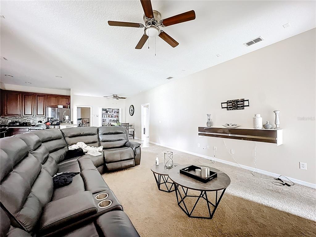 1692 Scrub Jay Road Apopka, FL 32703 - Photo 21 of 35 a living room with furniture