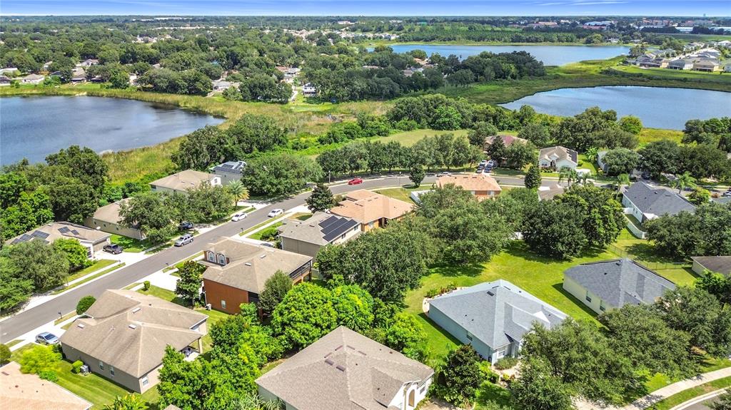 1692 Scrub Jay Road Apopka, FL 32703 - Photo 3 of 35 an aerial view of residential houses with outdoor space and river
