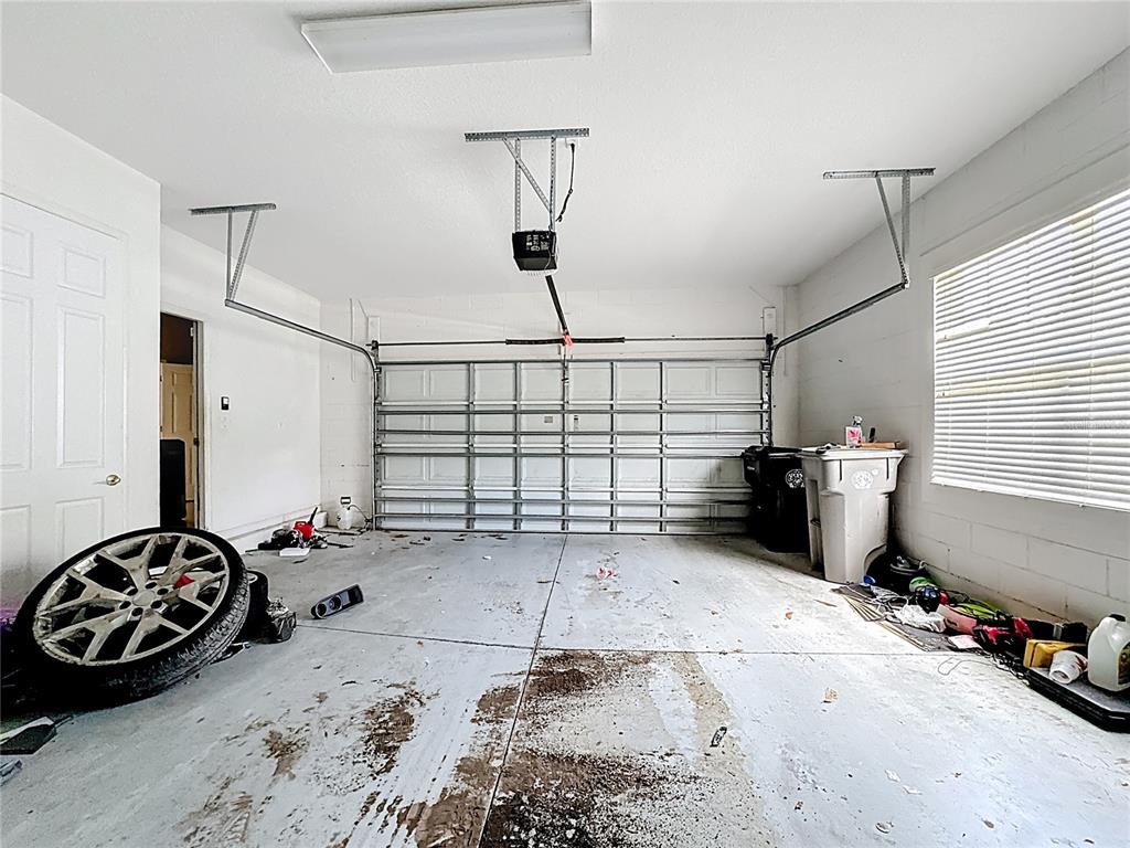 1692 Scrub Jay Road Apopka, FL 32703 - Photo 33 of 35 a view of a livingroom with storage and utility