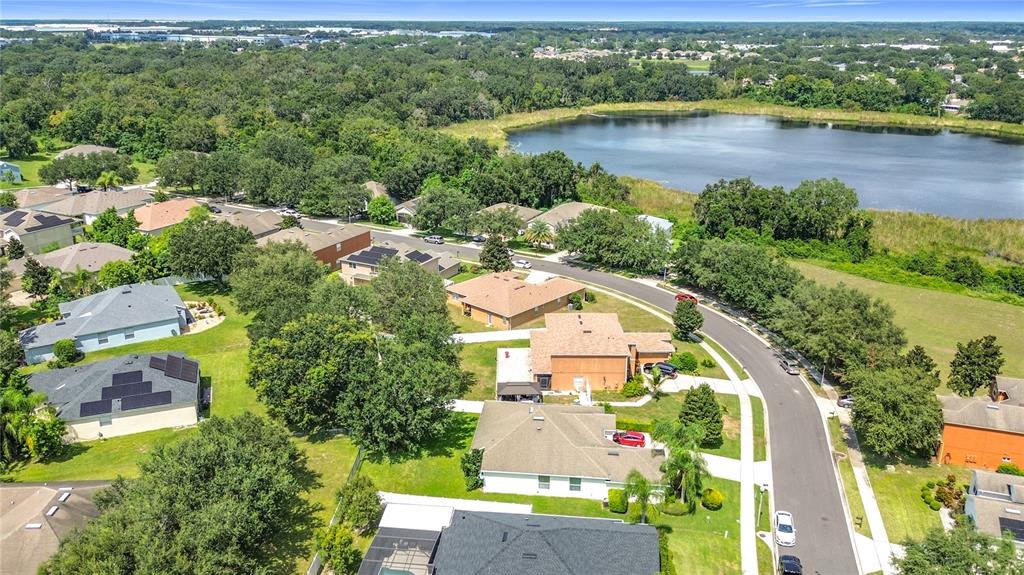1692 Scrub Jay Road Apopka, FL 32703 - Photo 5 of 35 an aerial view of a house with outdoor space and lake view