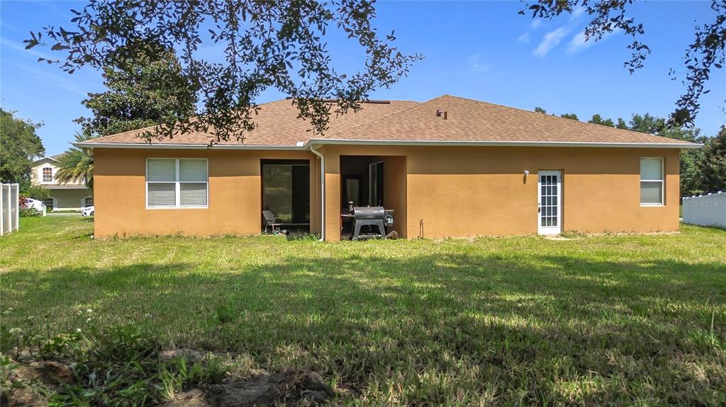 1692 Scrub Jay Road Apopka, FL 32703 - Photo 7 of 35 a view of a house with a backyard