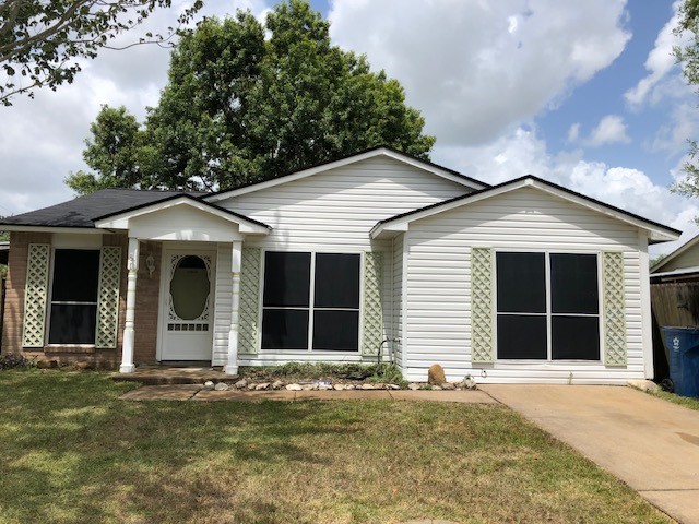 Adorable Ranch home with converted garage.