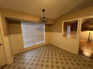 17407 Ranch Country Road Hockley, TX 77447 - Photo 3 of 14 a view of a room with a wooden door