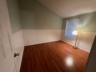 17407 Ranch Country Road Hockley, TX 77447 - Photo 8 of 14 a view of an empty room with wooden floor and a window