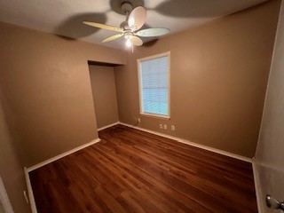 17407 Ranch Country Road Hockley, TX 77447 - Photo 9 of 14 an empty room with wooden floor fan and windows