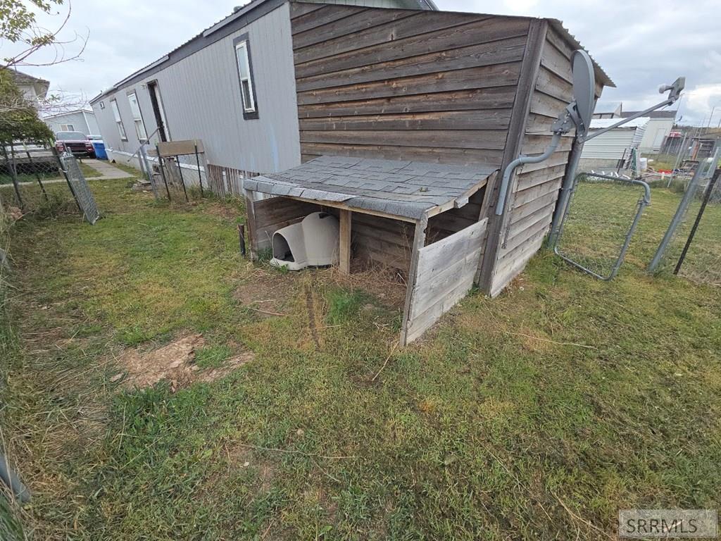 4986-2 South 2000 West Rexburg, ID 83440 - Photo 26 of 28 FENCED PET YARD HAS A GATE ON BOTH SIDES!