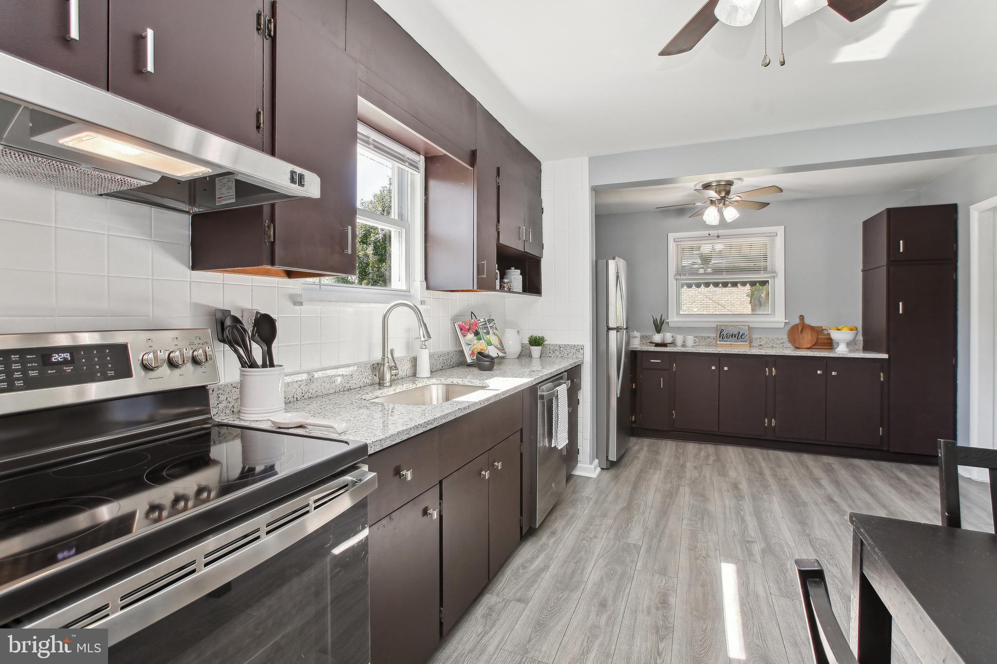 10711 Scaggsville Road Laurel, MD 20723 - Photo 12 of 34 Extra countertops and cabinets