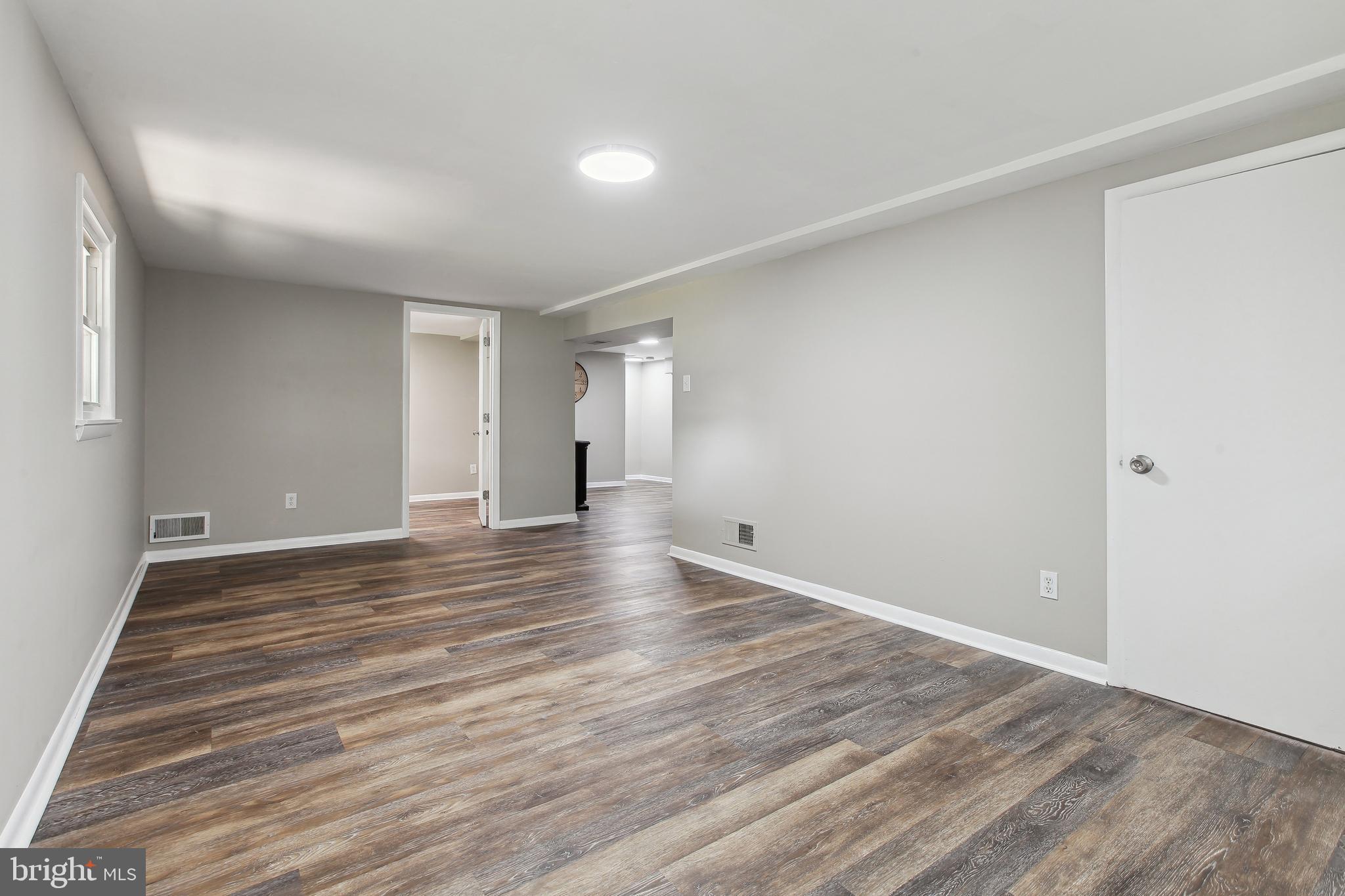 10711 Scaggsville Road Laurel, MD 20723 - Photo 21 of 34 Luxury vinyl plank flooring and recess lighting
