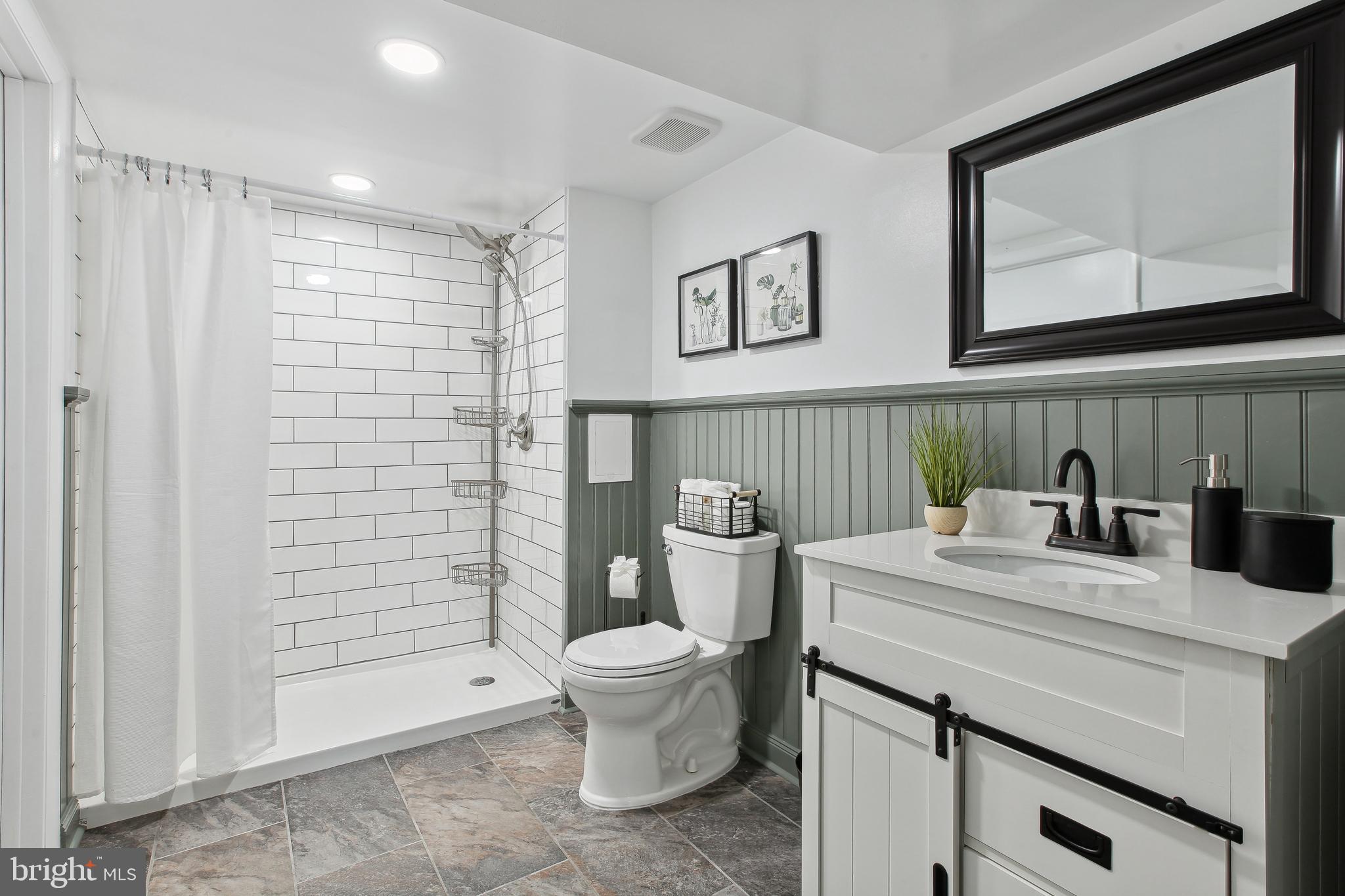 10711 Scaggsville Road Laurel, MD 20723 - Photo 25 of 34 Convenient brand new full bathroom in basement