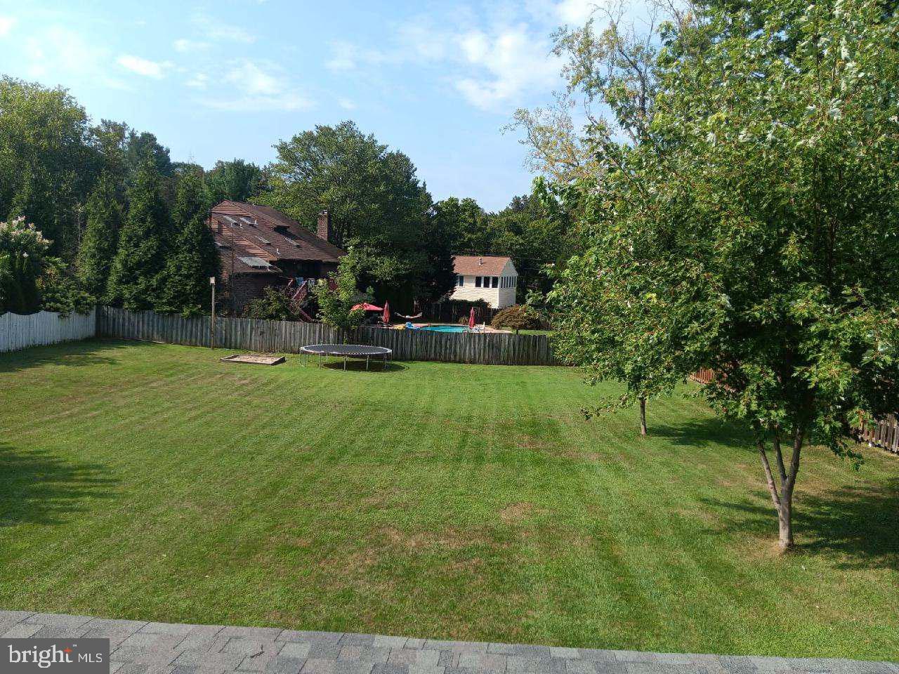10711 Scaggsville Road Laurel, MD 20723 - Photo 28 of 34 Sweeping view of the private & fenced in back yard
