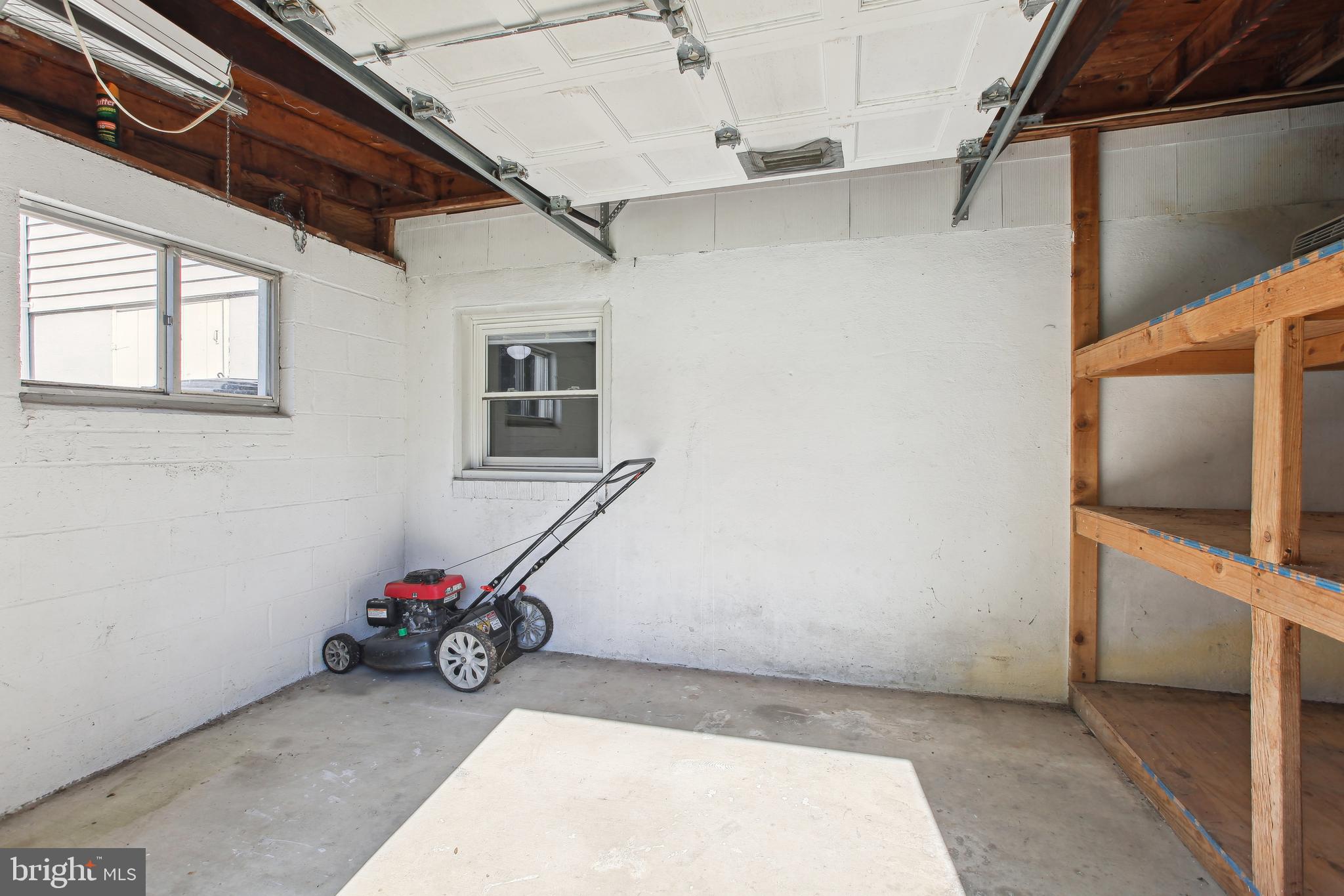 10711 Scaggsville Road Laurel, MD 20723 - Photo 34 of 34 Garage with built in shelves