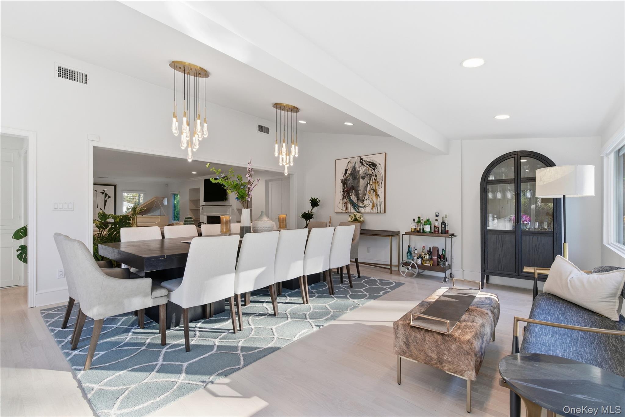 108 Bacon Road Old Westbury, NY 11568 - Photo 15 of 39 a living room with furniture and a wooden floor