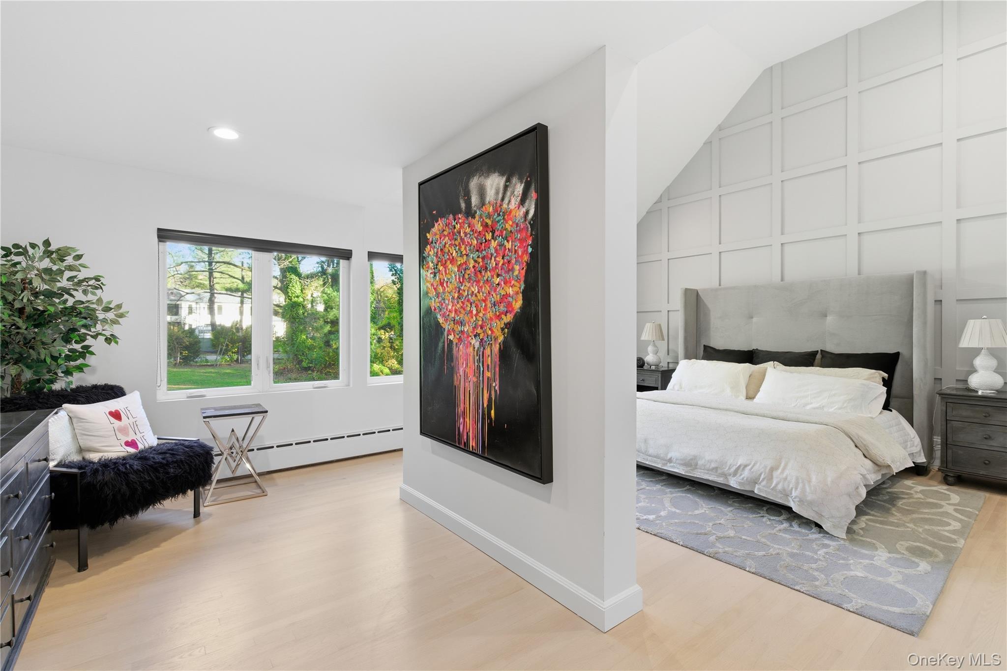 108 Bacon Road Old Westbury, NY 11568 - Photo 20 of 39 a living room with furniture and a flat screen tv