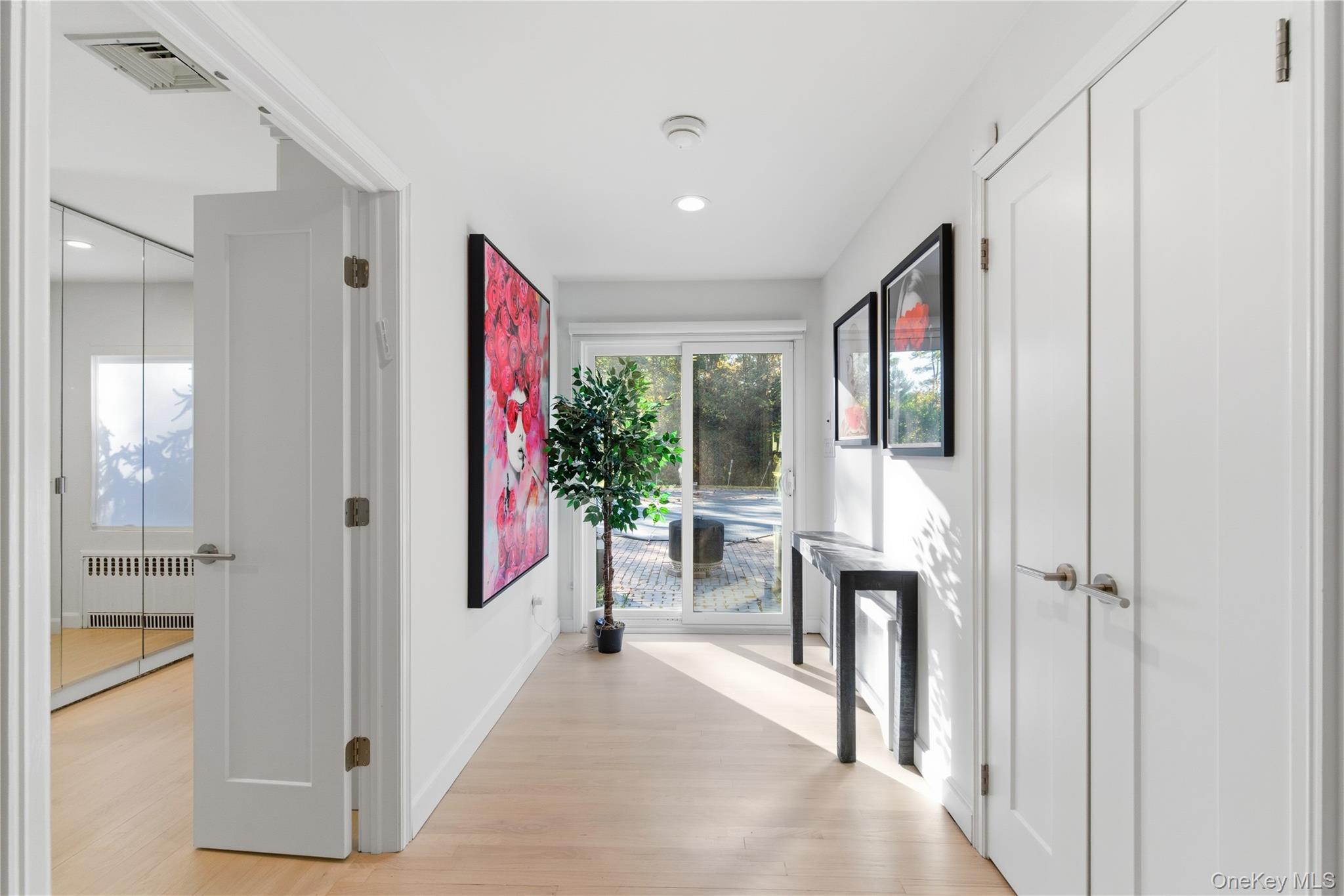108 Bacon Road Old Westbury, NY 11568 - Photo 22 of 39 a view of entryway with livingroom and furniture