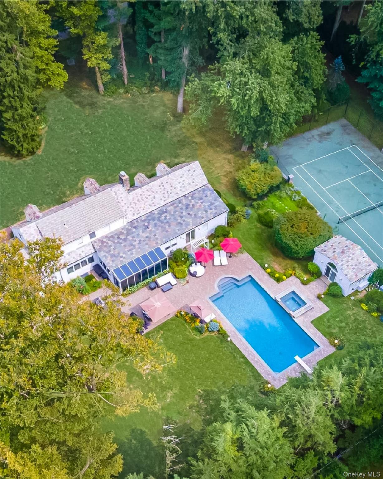 108 Bacon Road Old Westbury, NY 11568 - Photo 34 of 39 an aerial view of a house