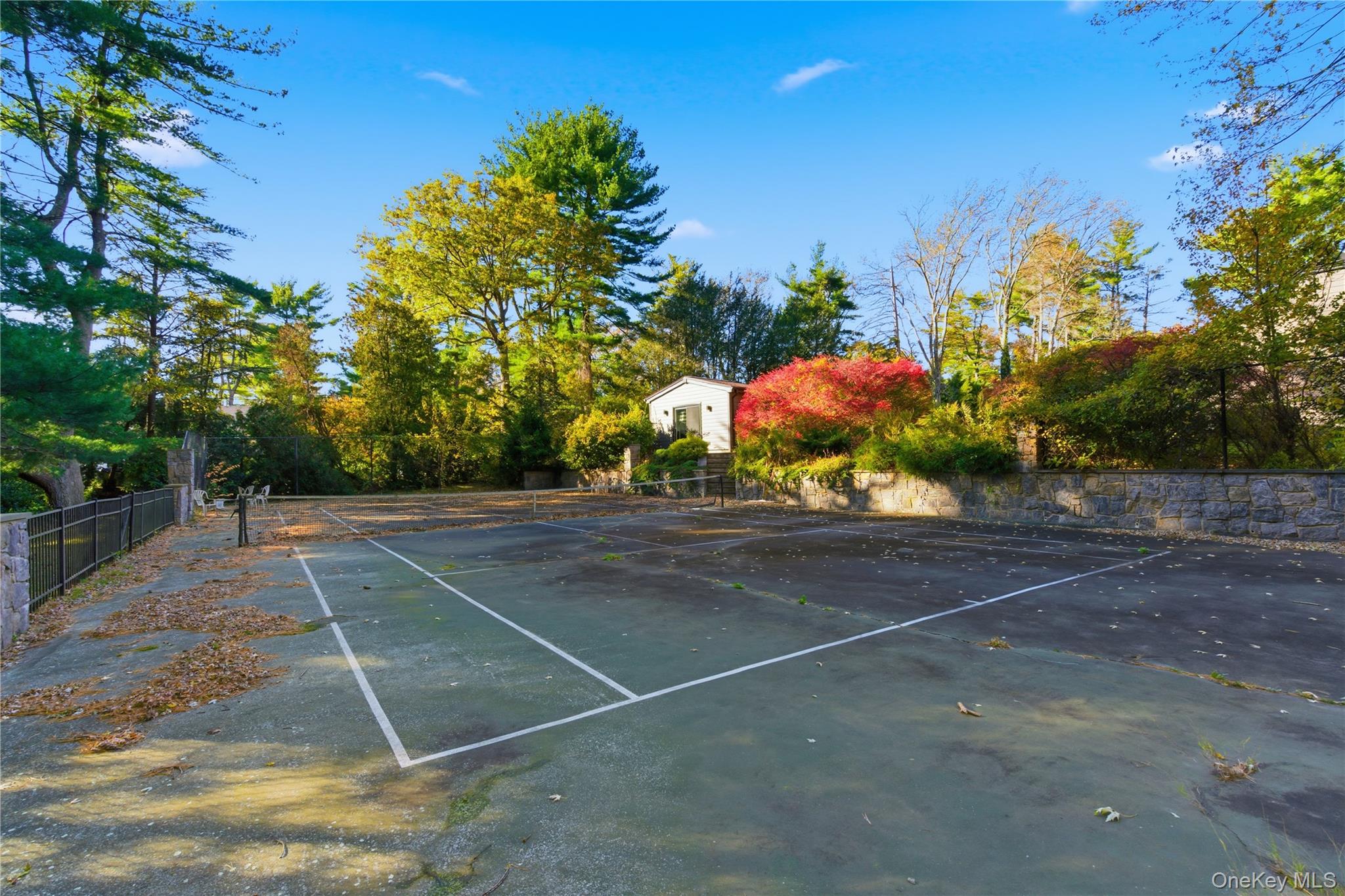 108 Bacon Road Old Westbury, NY 11568 - Photo 38 of 39 a view of a tennis court