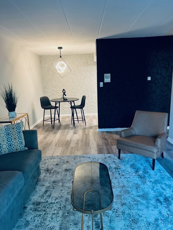 2345 185th Court, Unit 16 Lansing, IL 60438 - Photo 3 of 12 a living room with furniture and a lamp