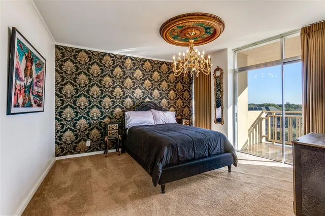 a kitchen with cabinets appliances a sink and a window