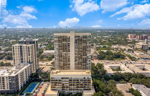 a view of a city with tall buildings