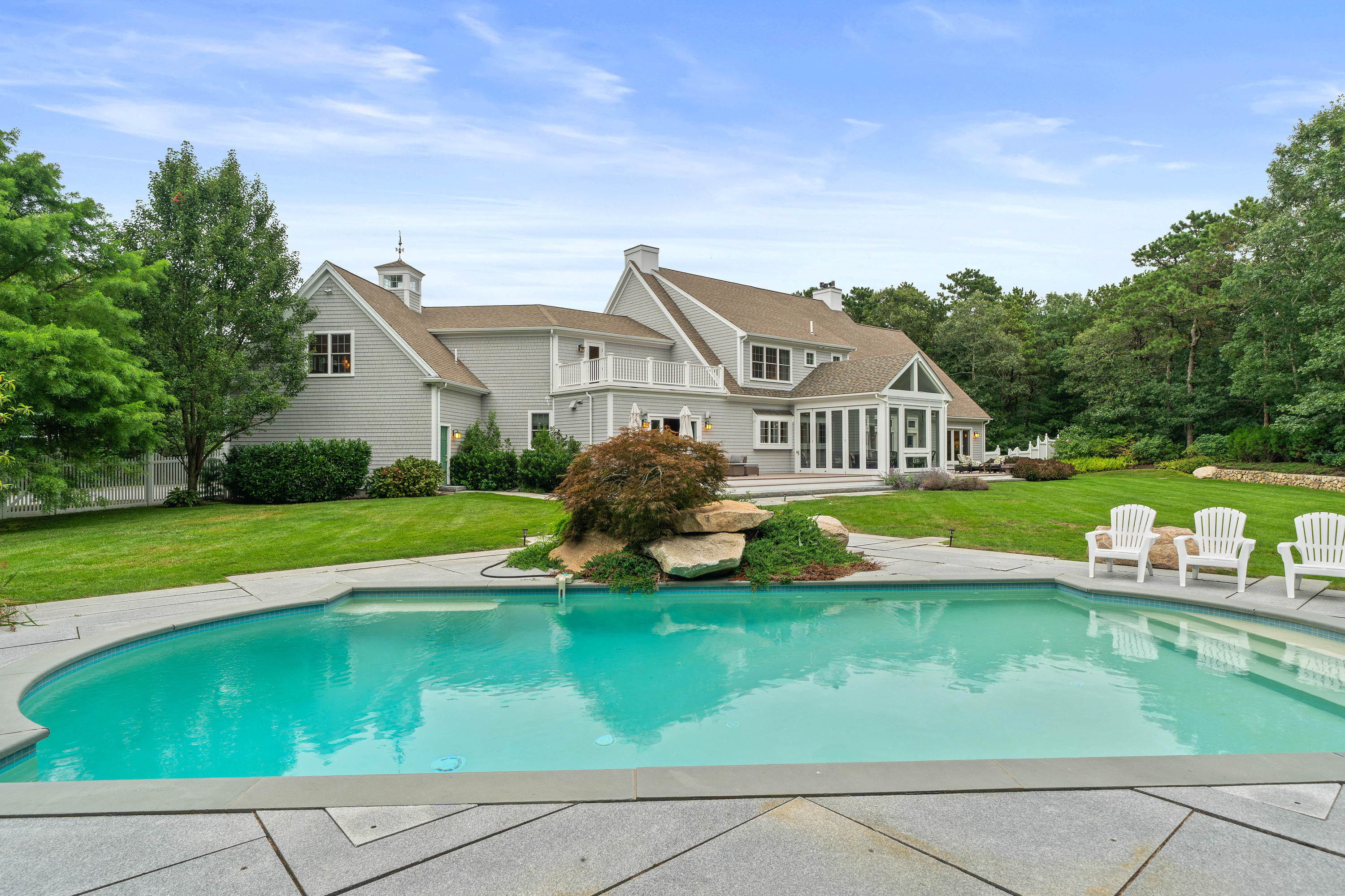 87 Seapuit Road Osterville, MA 02655 - Photo 36 of 39 a view of a house with a big yard plants and large trees